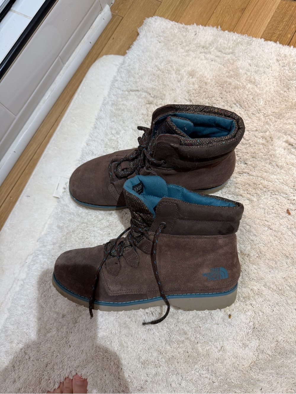 The North Face Women’s Brown Suede Boots with Teal Lining